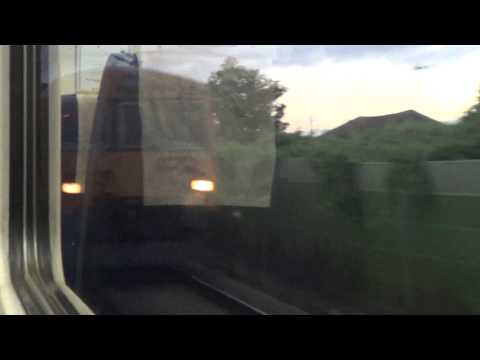 CP onboard 592 DMU passing another 592 DMU