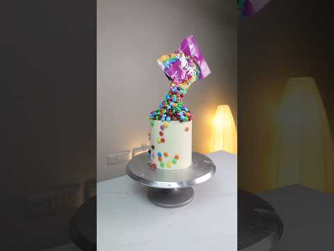 Make this super realistic gravity cake with skittles!!