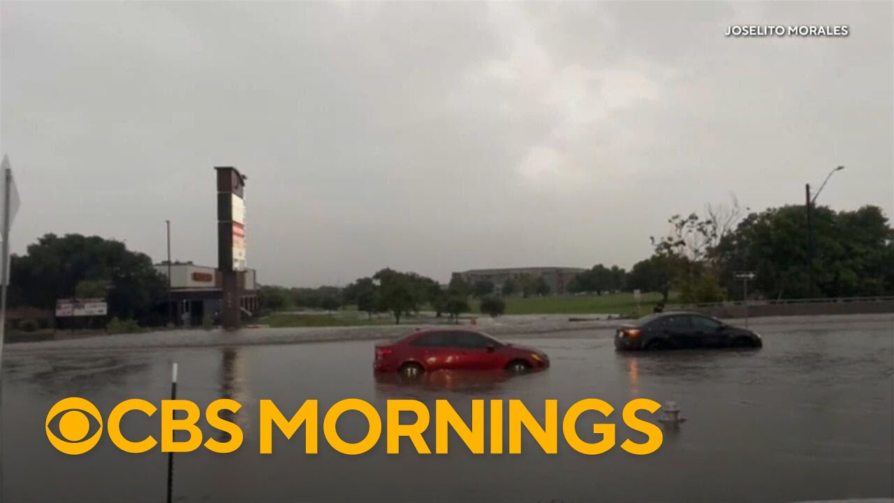 Heavy rain slams Texas, trapping drivers and damaging roads
