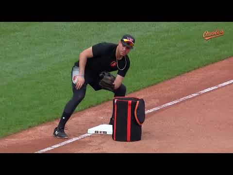 Bobby Dickerson instructs Renato Núñez on a proper tag