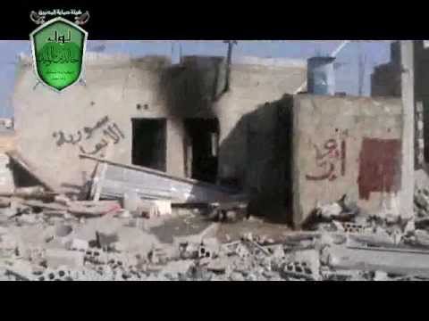 آثار الدمار في أحد المقرات التي كان يتمركز فيها عناصر النظام في مدينة القصير