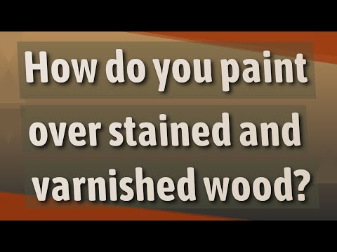 How do you paint over stained and varnished wood?