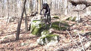 A large slab that ends in a small drop on the original part of log trail.