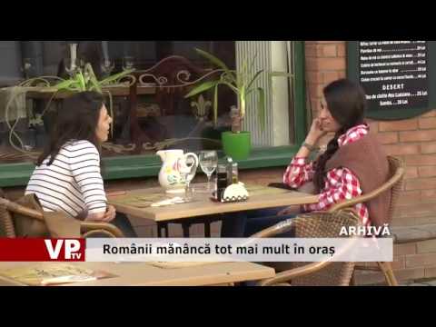 Românii mănâncă tot mai mult în oraș