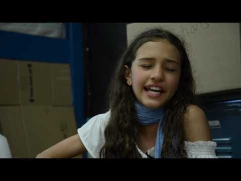 12 Year old Zia Victoria sharing her experiences and music at an ESF Camp