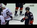 Perry tries to steal Hossa’s stick