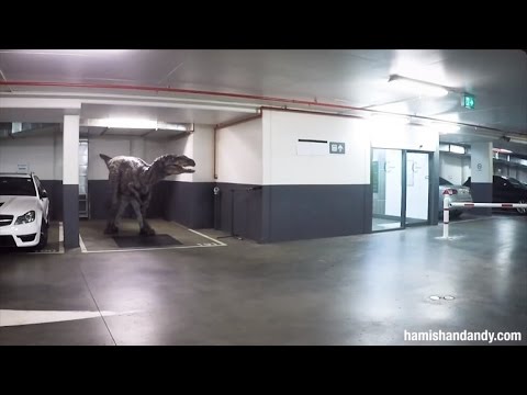 Employees Freak Out Co-Workers With Realistic Dinosaur in Parking Garage