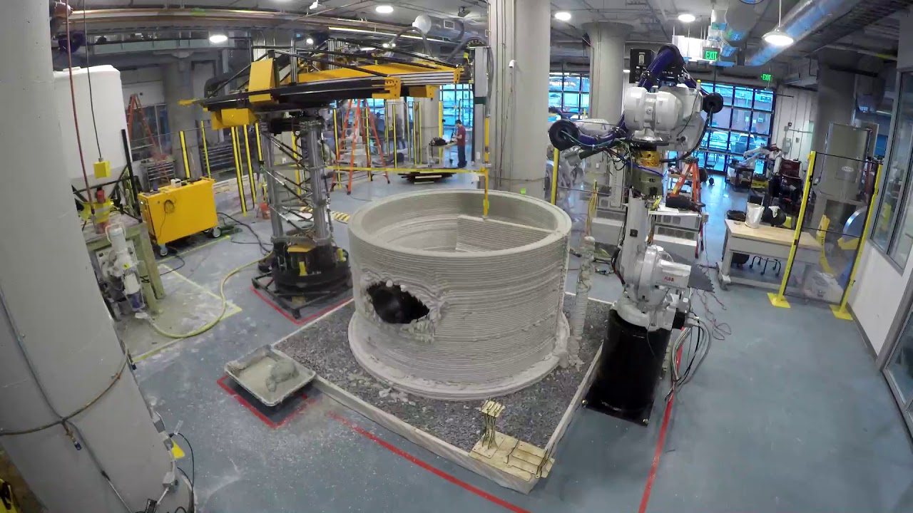 Apis Cor 3D printing robot to build continuous walls of whole houses on-site without extra assembly.