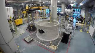 Apis Cor 3D printing robot to build continuous walls of whole houses on-site without extra assembly.