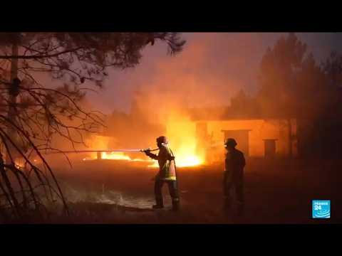 French firefighters work tirelessly to stop blaze from spreading