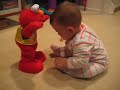 Cute Baby And Elmo