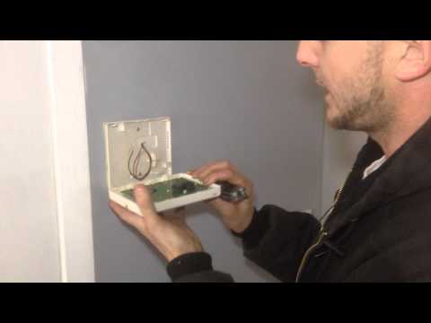 How to Stop a Beeping Alarm System | Home Repair