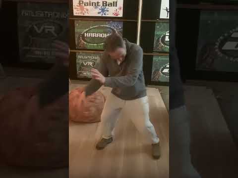 Rob demonstrating ping-pong ball picker upper￼