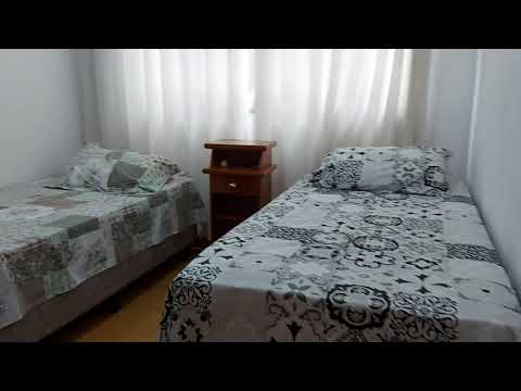 kit dividida com área de serviço e vaga no canto do forte em Praia Grande