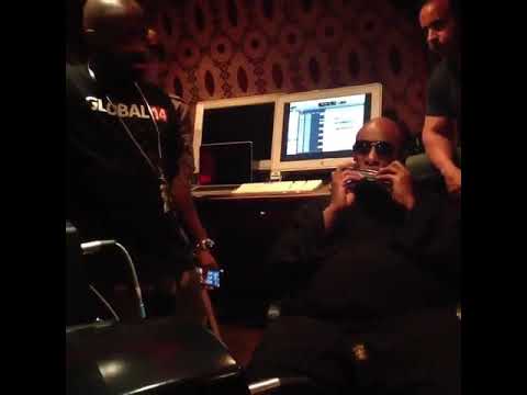 Jermaine Dupri on the phone with Mariah Carey while Stevie Wonder playing the Harmonica !!!