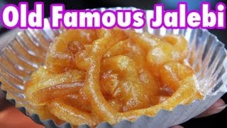 preview picture of video 'Old Famous Jalebi Wala - Indian donuts dripping with sweet syrup!'