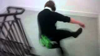 george trying to walk down the stairs