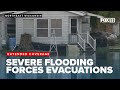 Extended coverage of major floods in Northeast Wisconsin; residents evacuated, record-breaking rain