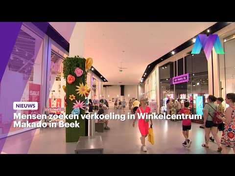 Mensen zoeken verkoeling in Winkelcentrum Makado in Beek