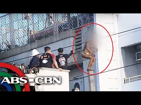 Man climbs up electric post in Antipolo City, walks on power cables | Coconuts