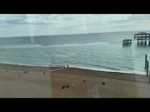 Alex and Denisa going up in the i360 in Brighton, August 30, 2023