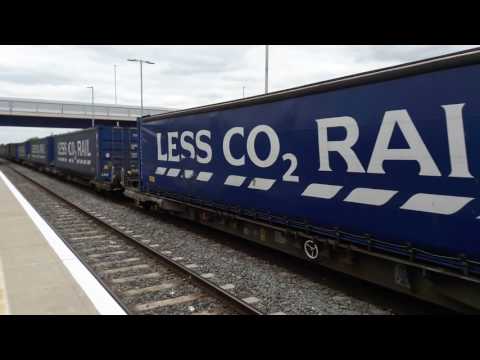 Freigtliner class 66 pull stobart rail wagons through ilkeston on 29/04/17