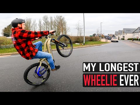 MY LONGEST WHEELIE EVER!!
