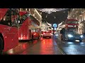 BUSY STREET IN LONDON AT NIGHT