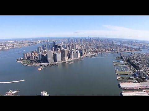 SPECTACULAR NYC VIEWS of Flight over East River to 42B SHORT RUNWAY in a VERY BUSY CLASS BRAVO