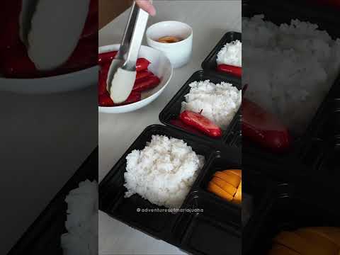 Today's lunch box: Rice + orange + Bananas + hotdogs