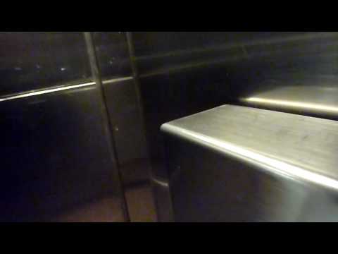 Vintage Montgomery hydraulic elevator - Complexe Desjardins parking