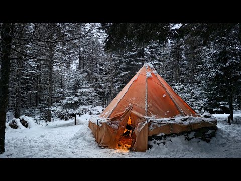 Winter Camping in our Bushcraft Shelter in a Snow Covered Wilderness.