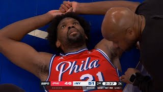 Joel Embiid insane self oop off glass for poster dunk but hurts his knee again 😬