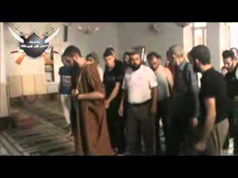 تشييع أيمن الديك أحد عناصر كتيبة سيف الله المسلول الذي قتل في حي القرابيص في مدينة حمص