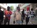 Haiti Latest: A day with 'Barbecue'; Head of one of Haiti's most powerful gangs