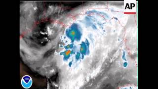 Tropical Storm Edouard took aim at the coasts of Texas and Louisiana Monday, threatening to pick up