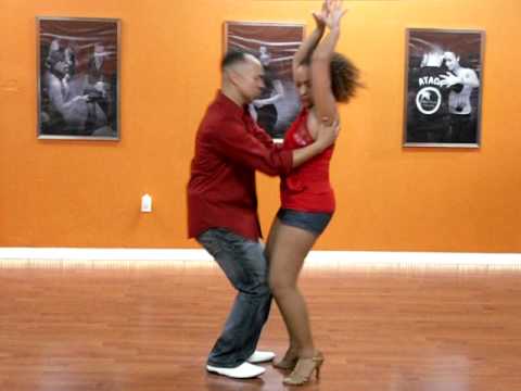 Island Touch's Hector "El Leon de la Bachata" and Liz performing during and ITDA social
