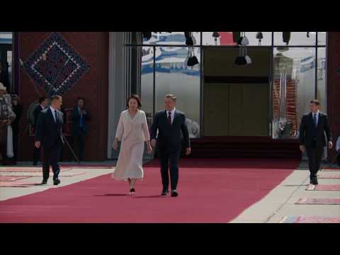 Kyrgyz president and his wife welcome Chinese President Xi Jinping at airport in Bishkek