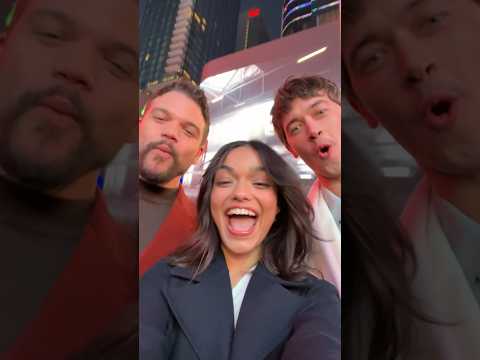 Tom Blyth, Rachel Zegler and Josh Andres Rivera in Times Square for The Hunger Games