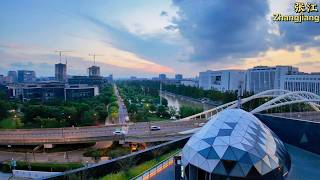 With MiaoMiao . . . Zhangjiang Science City, located in the Pudong district of Shanghai, is a major hub for scientific innovation and research in China. Often referred to as the `Silicon Valley of China,` Zhangjiang Science City has been a focal point for the development of high-tech industries, particularly in the fields of biotechnology, information technology, and advanced manufacturing. Key Features and Developments: Research and Development Hub: Zhangjiang Science City hosts numerous research institutions, universities, and corporate R&D centers. It`s home to the Zhangjiang National Innovation Demonstration Zone, which plays a critical role in fostering technological innovation. The area is known for its strong focus on life sciences, with many pharmaceutical companies and biotech firms operating there, including multinational corporations like Roche and Novartis. Tech Startups and Incubators: The region has a thriving startup ecosystem, supported by various incubators and accelerators. This makes it an attractive destination for tech entrepreneurs and innovators. The Shanghai Zhangjiang Hi-Tech Park, within the science city, is one of China`s most prominent technology parks, providing resources and infrastructure for startups. International Collaboration: Zhangjiang Science City emphasizes international collaboration, with numerous foreign enterprises establishing their R&D centers there. The area facilitates joint ventures and partnerships between Chinese and global companies. The establishment of free trade zones and favorable policies has further encouraged international investment and collaboration. Smart City Development: As part of the broader Shanghai initiative, Zhangjiang is being developed into a `smart city` with advanced infrastructure for communications, transport, and urban living. The integration of AI, big data, and IoT technologies into the city’s infrastructure is a key aspect of its development, making it a model for future urban areas. Education and Talent: The science city benefits from proximity to top-tier universities and research institutions, which supply a steady stream of talent in various scientific and engineering disciplines. Efforts are made to attract and retain international talent, offering competitive incentives and a conducive environment for innovation. Government Support: The Chinese government has prioritized Zhangjiang as a key area for the country’s strategic technology development. Policies are in place to support research, attract investment, and encourage innovation. Significant investments have been made in infrastructure, including transport links that connect Zhangjiang to other parts of Shanghai and beyond, enhancing its accessibility and appeal as a business location. Future Prospects: Zhangjiang Science City is poised to continue its growth as a global leader in science and technology. With ongoing investments and a focus on high-tech industries, it is expected to play a significant role in China`s ambitions to become a world leader in innovation and technology by the mid-21st century. The combination of government support, international collaboration, and a strong innovation ecosystem makes Zhangjiang Science City a critical component of Shanghai`s, and indeed China`s, future development strategy. ZhangJiang Science City, PuDong, ShangHai