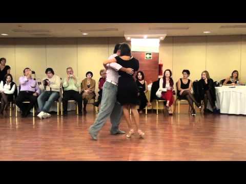  Roxana Suarez  and  Sebastian Achaval  are  dancing  to  the  tango  "  Tristeza De La Calle Corrientes  "