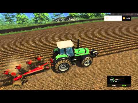 farming simulator 2015 getting the field ready part 2 ploughing