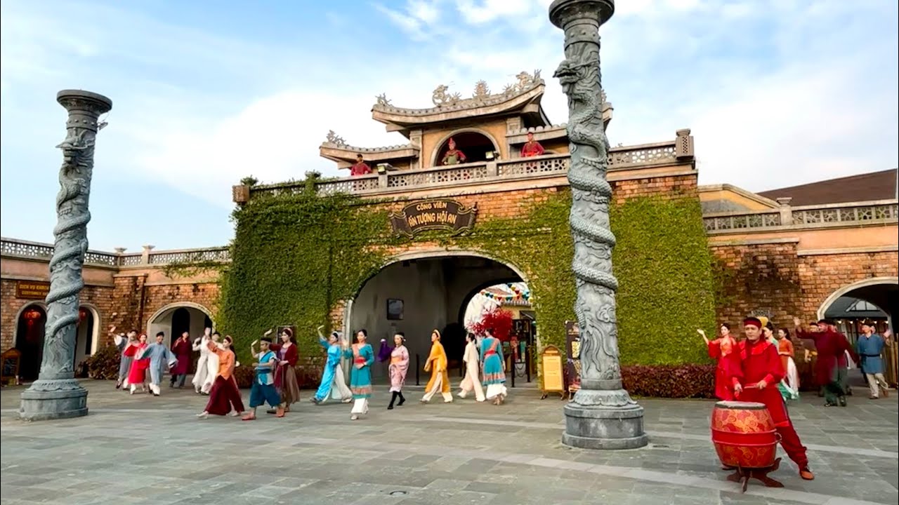 A vibrant cultural show at Hoi An Impression Theme Park highlights Vietnam's traditions with colorful costumes and dramatic performances.