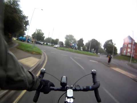 Blue truck pulls out without seeing the cyclist (SMIDSY)