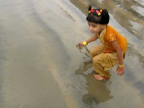 Arifa playin in beach