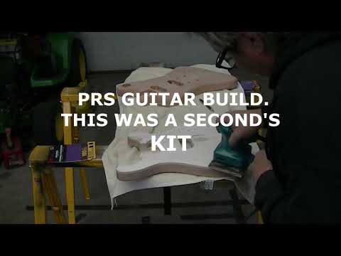 1. PRS STYLE GUITAR KIT SANDIND AND STAINING THE BACK  OF THE GUITAR