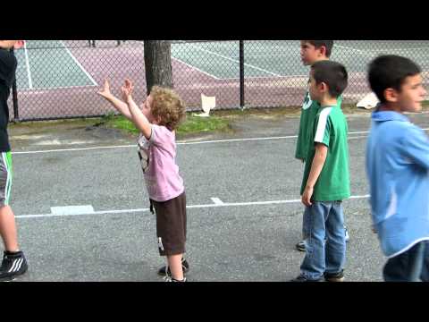 Nolan playing basket ball
