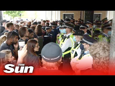 Anti-vaccine protesters try to storm BBC studios as they clash with cops during rally