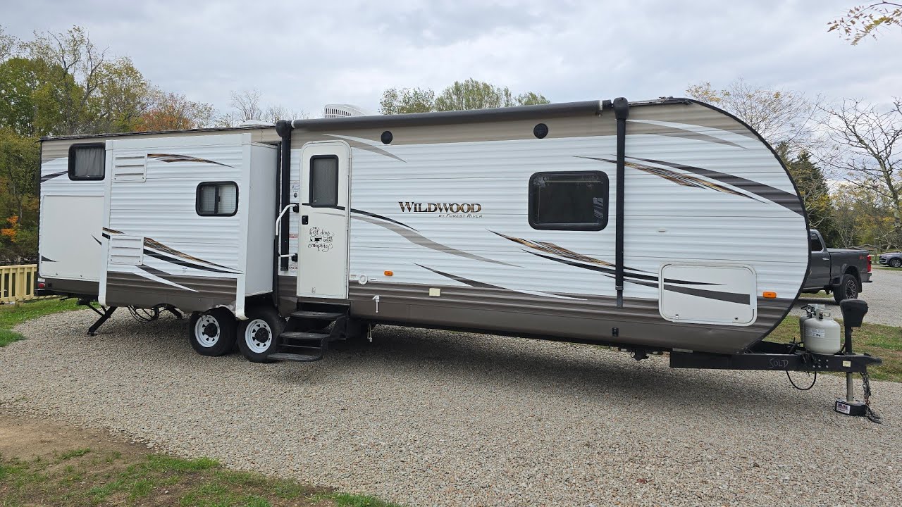 FOR SALE - 2016 Wildwood 31BHIS Triple Slide Travel Trailer - $6,850