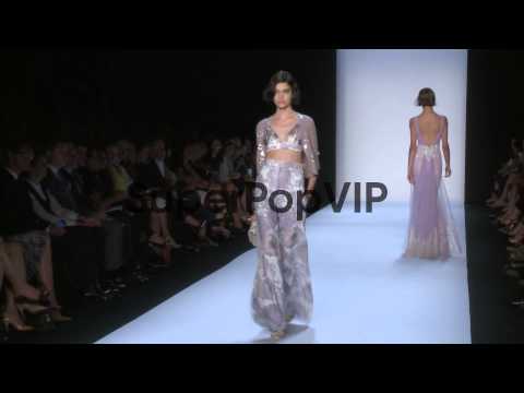 Models walk the runway at Badgley Mischka - Spring 2014 M...